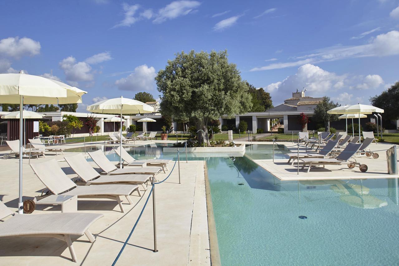 Borgo Di Luce I Monasteri Golf Resort & Spa Syrakuzy Zewnętrze zdjęcie The swimming pool at the resort